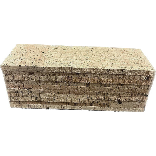 Natural cork strips adhered to form a solid cork block